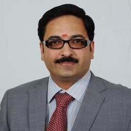 Dr.Dinesh Kartha